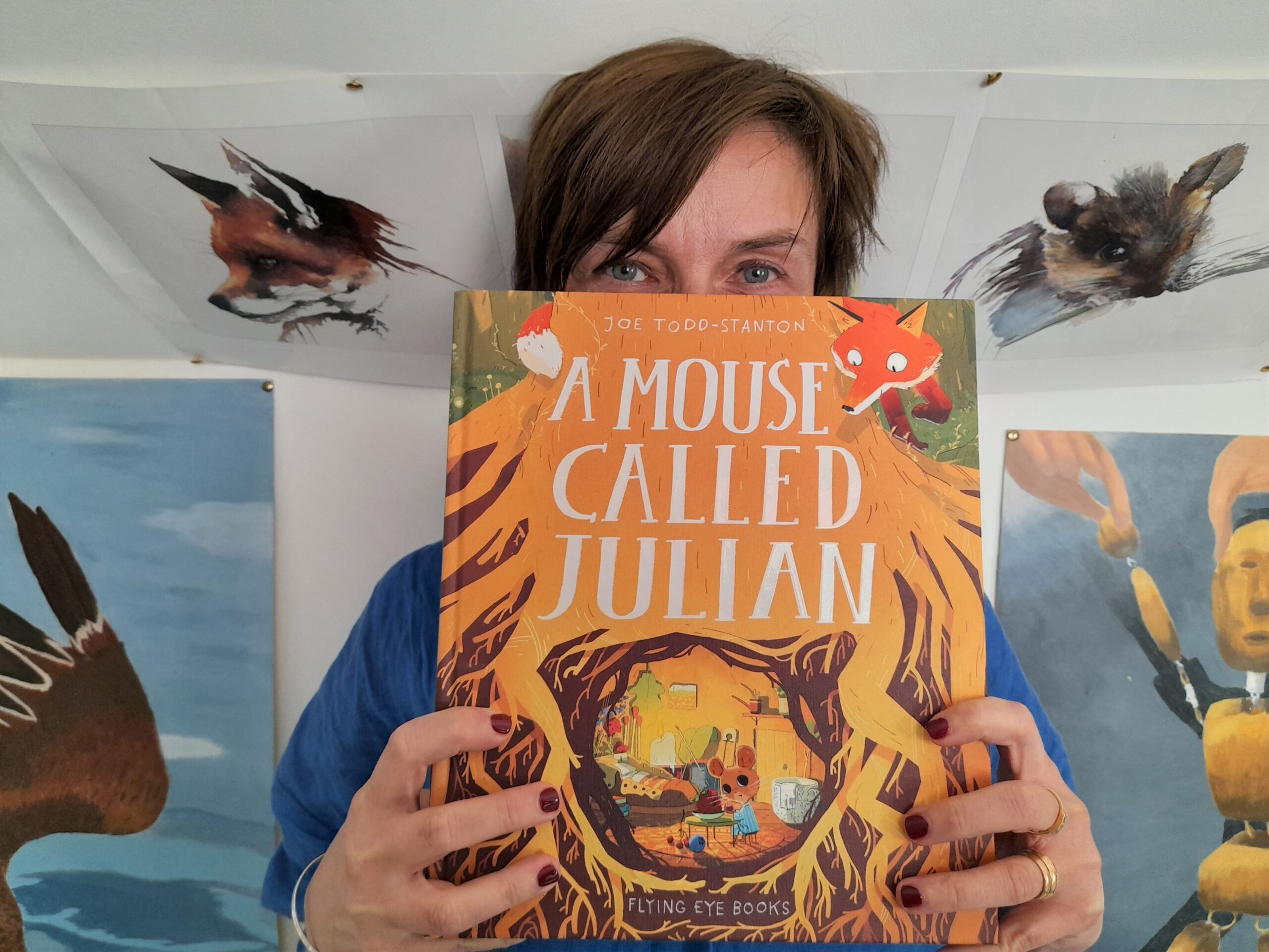 Beata holding the book A Mouse Called Julian