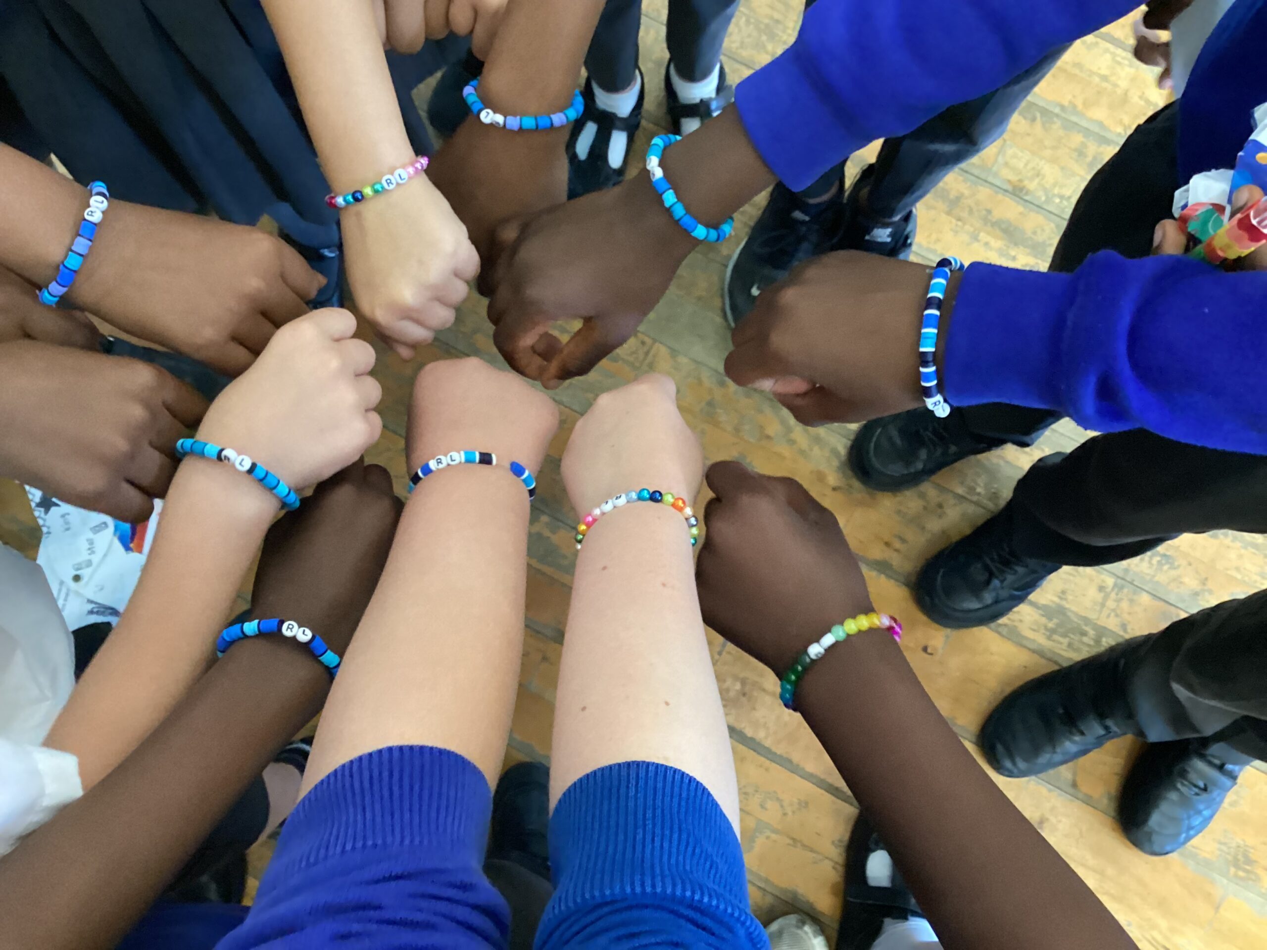 Children showing their bracelets